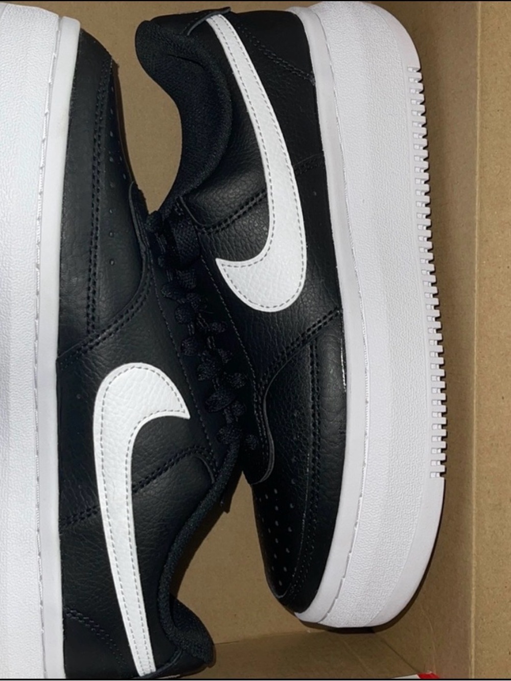 Nike Women’s Black and White Air Force 1 Low Sneakers
